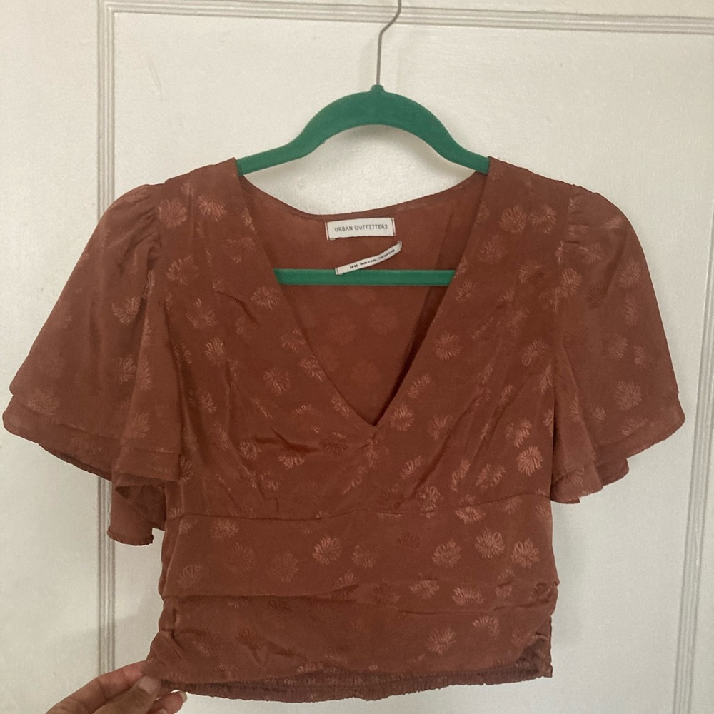 Tan silky top from Urban Outfitters